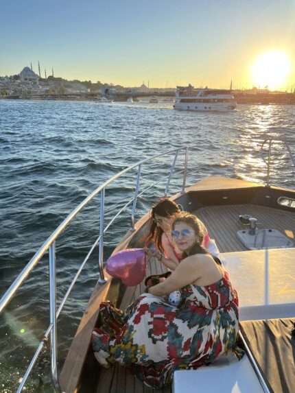 Birthday celebration with balloons on a private yacht deck in Istanbul