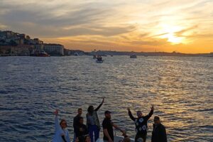 Blue hour celebration on the foredeck of a private Bosphorus yacht