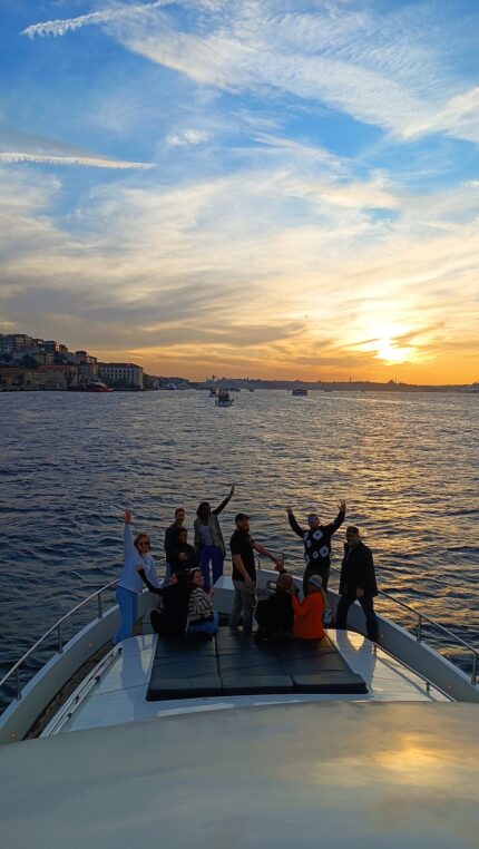 Blue hour celebration on the foredeck of a private Bosphorus yacht