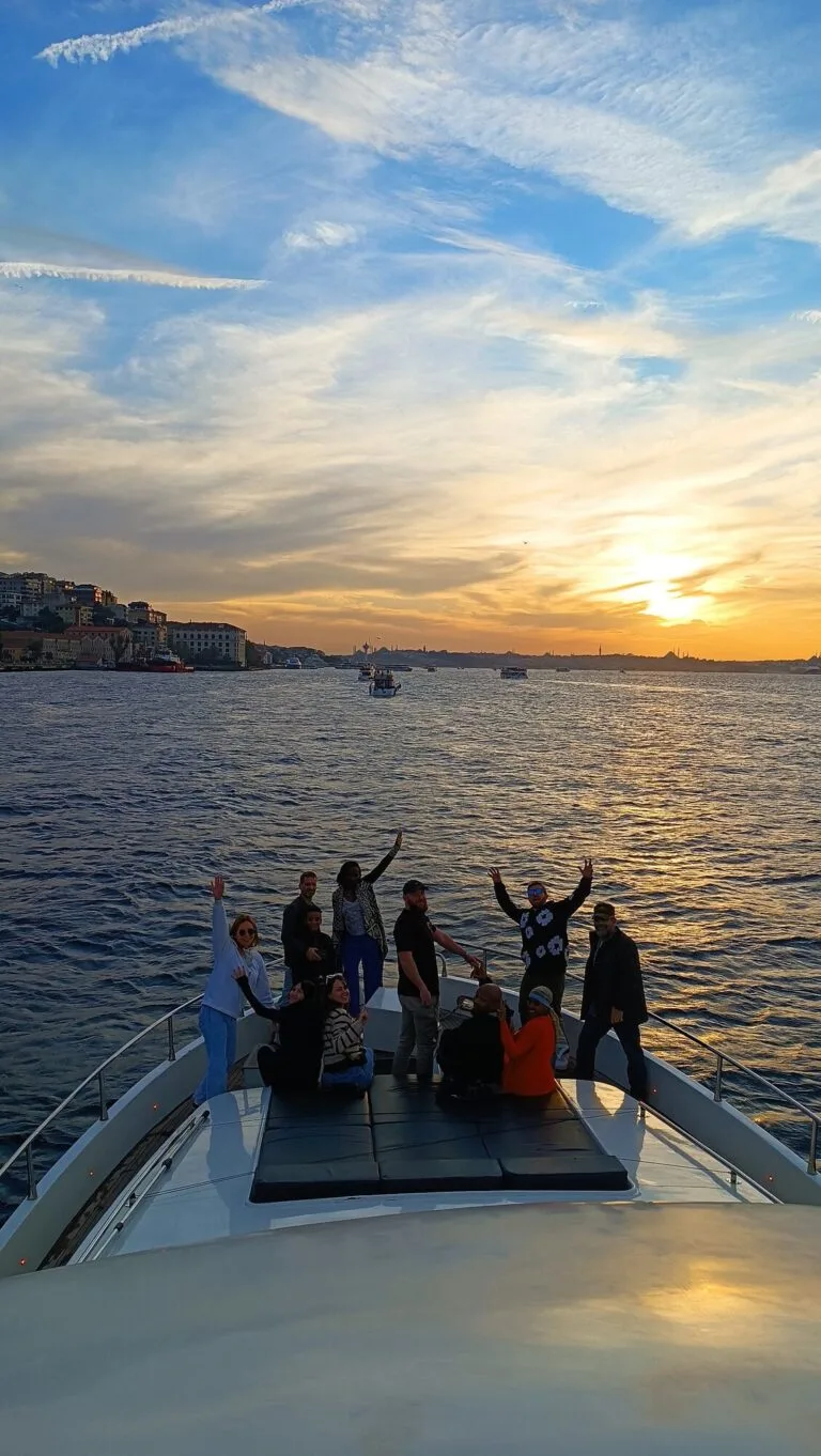 Blue hour celebration on the foredeck of a private Bosphorus yacht