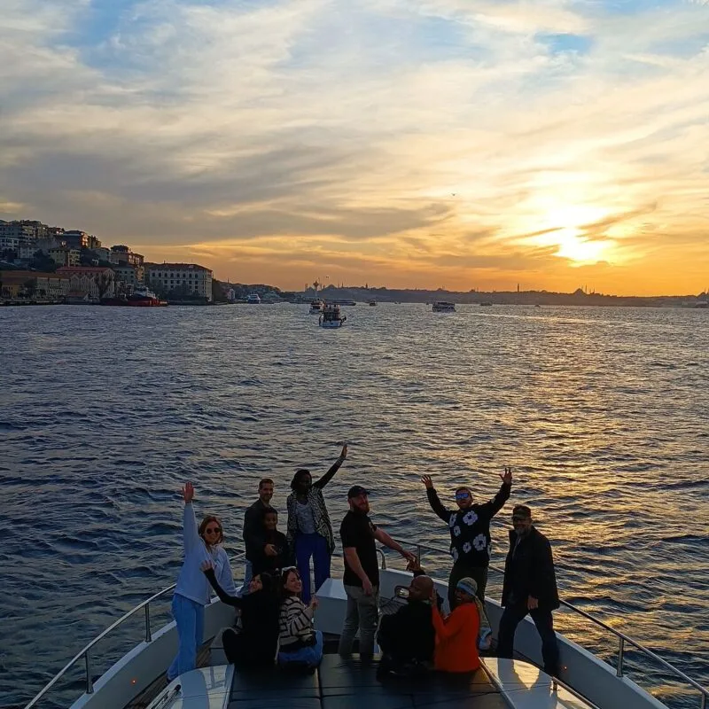 Blue hour celebration on the foredeck of a private Bosphorus yacht