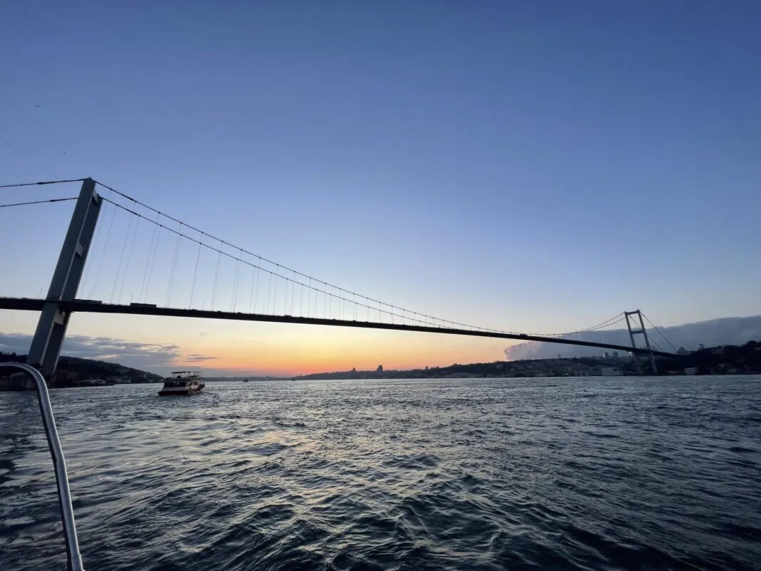 Bosphorus Bridge at blue hour seen from a private yacht tour