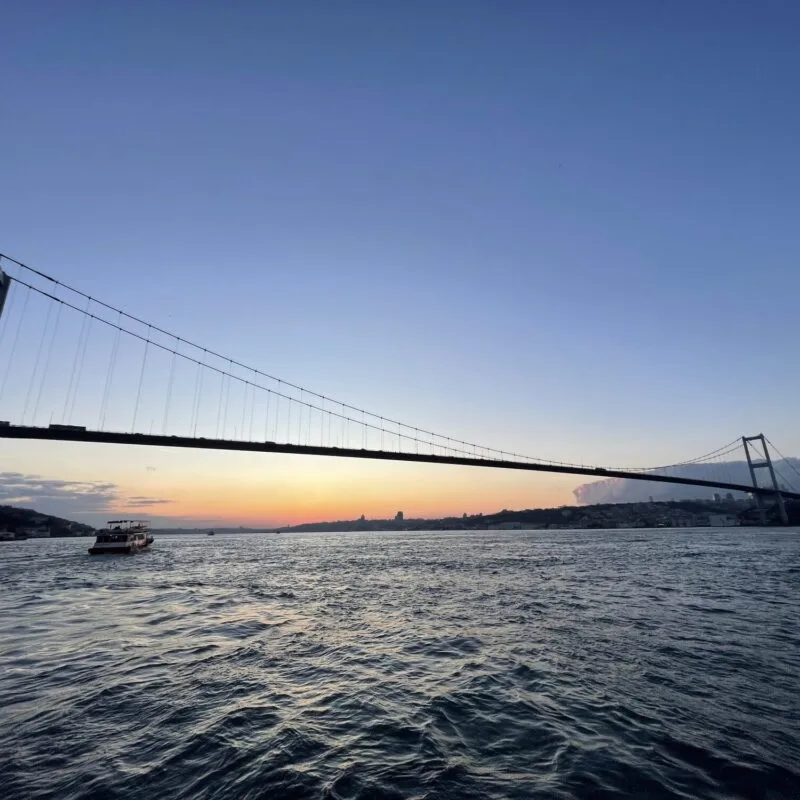 Bosphorus Bridge at blue hour seen from a private yacht tour