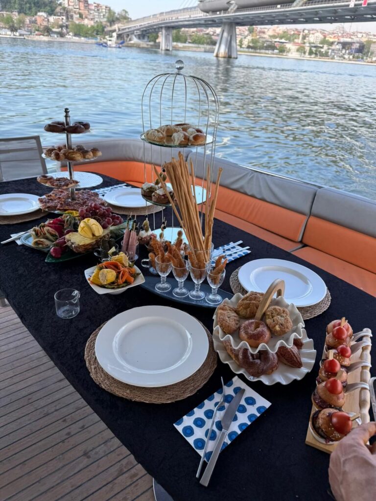 Catering treats display on the yacht deck with Bosphorus views