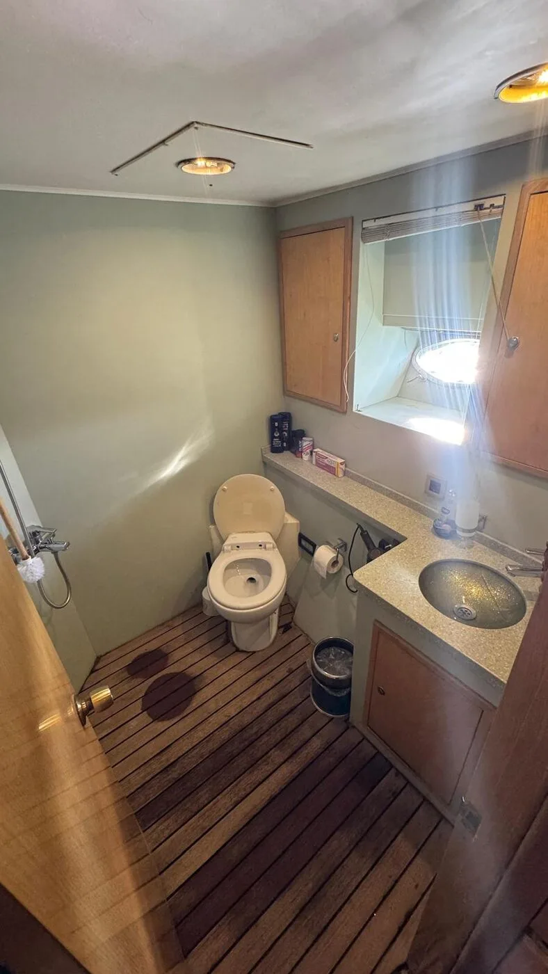Onboard bathroom with a shower and hot water