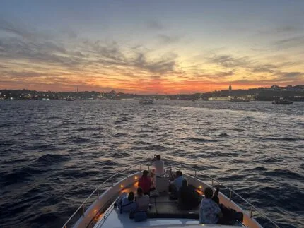 Evening city lights of Istanbul seen from a private yacht cruise