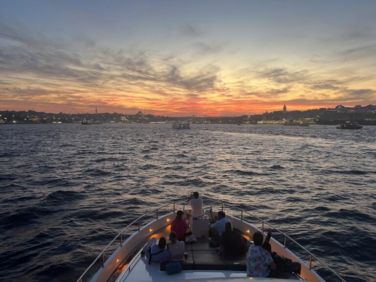 Evening city lights of Istanbul seen from a private yacht cruise