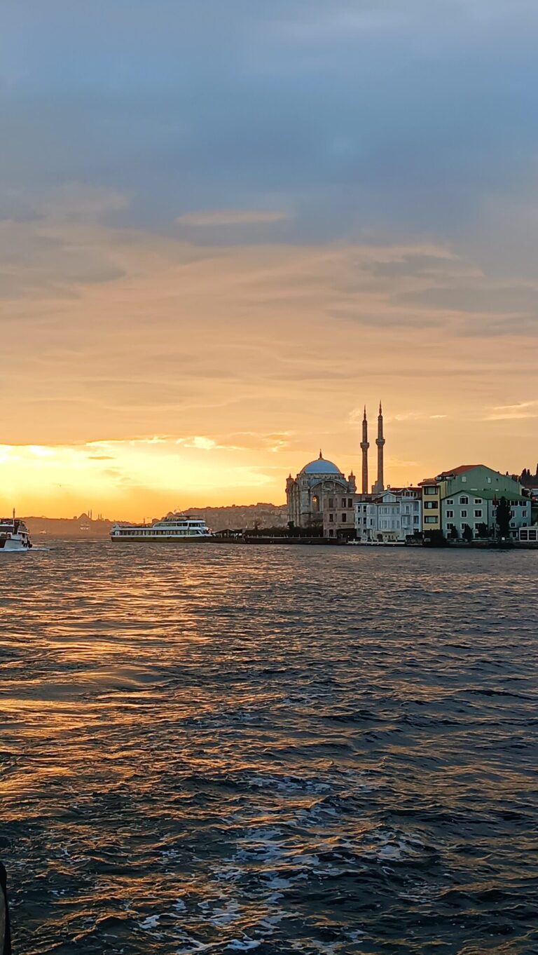 Ortakoy Mosque at sunset seen from a yacht on the Bosphorus
