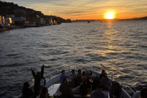 Group sunset cruise on the Bosphorus with hillside views