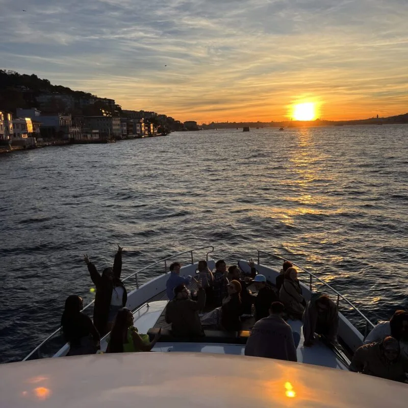Group sunset cruise on the Bosphorus with hillside views